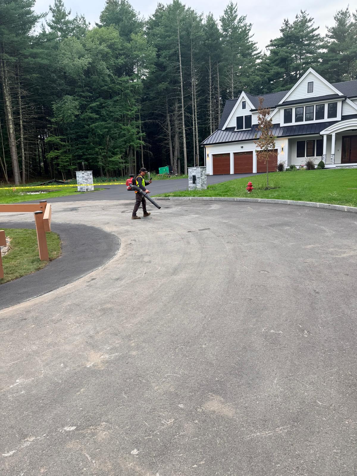 Residential circular driveway before sealcoating preparation